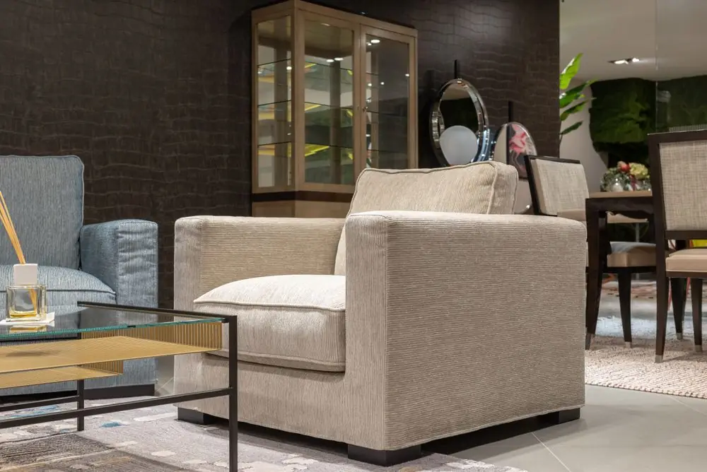 Beige lounge armchair in a showroom